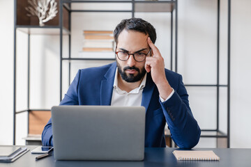 Making a mistake.Tired concentrated hard-working businessman dealing with job problems, failure,...