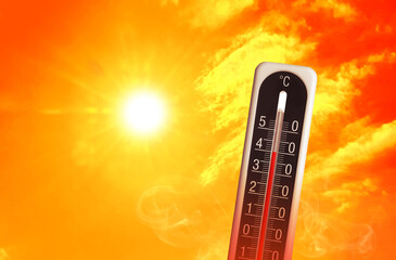 Weather thermometer with high temperature outdoors on hot sunny day. Heat stroke warning - obrazy, fototapety, plakaty