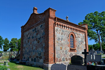 A Catholic cemetery chapel built in 1818 in the village of Lachowo in Podlasie, Poland.