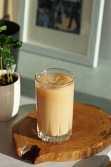 Iced coffee with ice in a tall glass