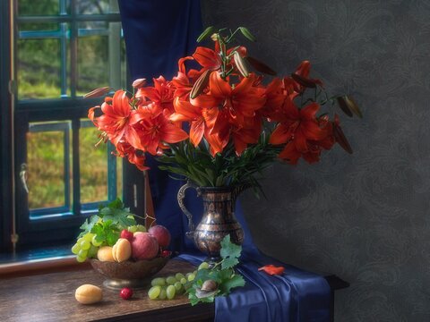 Still life with lily flowers and fruits