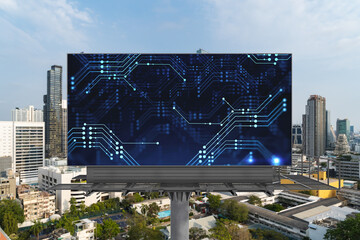 Technology hologram on billboard over panorama city view of Bangkok. The largest tech hub in...