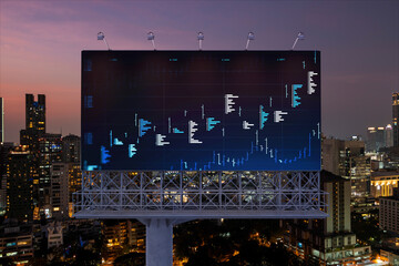 FOREX graph hologram on billboard, aerial night panoramic cityscape of Bangkok. The developed location for stock market researchers in Southeast Asia. The concept of fundamental analysis