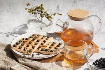 Homemade belgian waffles with berries and tea