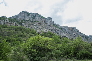 Fototapeta na wymiar Rocks on the Mount Ai-Petri over the seaside town in Crimea.Beauty of nature. Pure ecology. Crimea mountains.