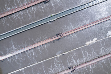 Round facility industrial sewage treatment plant of city, aerial top view