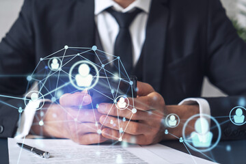 A potential employee in formal wear reading the contract to boost his career and gain new opportunities in personal growth. Checking the details of the deal at smartphone. Social media hologram icons