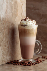 Milk coffee cocktail with whipped cream.