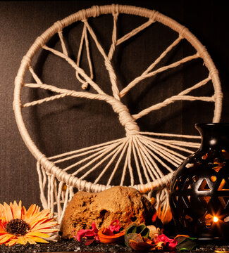 Dream catcher, candle an dead nature