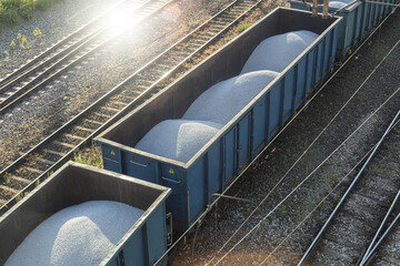 Fototapeta premium Freight train with white gravel, top view
