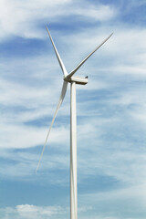 Offshore and Onshore Windmill farm in the sea ,windmills isolated at sea on a beautiful bright day in Ukraine