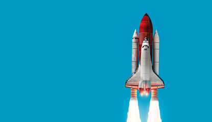 Space shuttle on blue background. Rocket in the sky. Space ship in space. Elements of this image furnished by NASA
