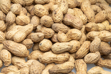 inshell peanuts close-up, organic peanuts