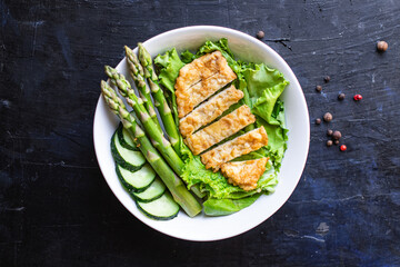green asparagus salad chicken meat bowl  greens salad leaves eating organic diet on the table healthy food meal snack copy space food background rustic. top view