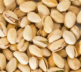 Salted, roasted green pistachio nuts snack, healthy food snack