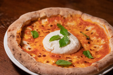 Rustic Italian pizza with burrata cheese