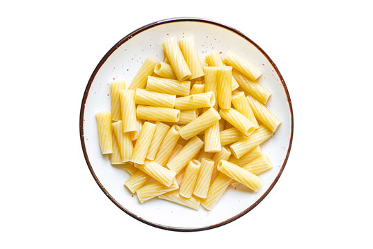 pasta in a plate on the table macaroni ziti penne italian cuisine healthy food meal snack copy space food background rustic. top view
