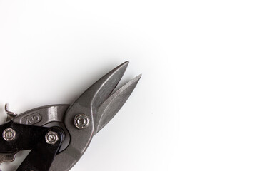 Metal scissors on a white background. Space for the text. An isolated hand tool.