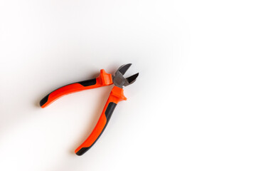 Wire cutters on a white background. Space for the text. An isolated hand tool.