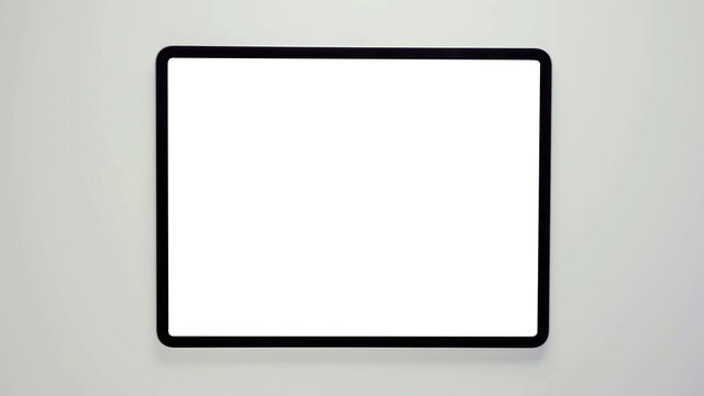 A tablet with black frame and blank white screen, isolated modern real tab computer 3D with copy space mockup.