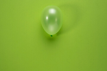 A balloon on a green background