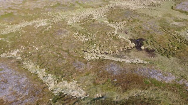flying over the mighty plains of the mageroy island in Nordkapp, north cape, county in summer, aerial overview shot