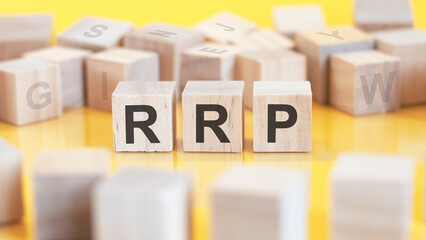 word rrp written on wood blocks, concept