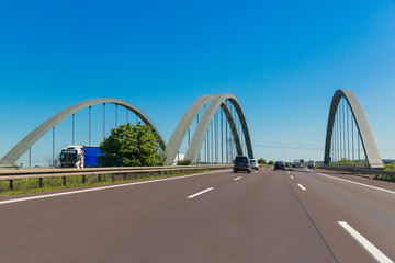 June 2, 2021 Germany, Bavaria. Cars drive over a bridge on an expressway in Germany
