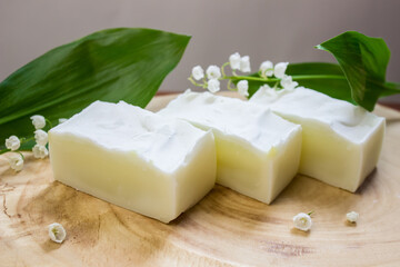 extract of May lily of the valley oil with plant and flower. Natural soap from scratch, handmade.