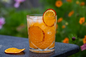 Orange juice and vodka cocktail with ice