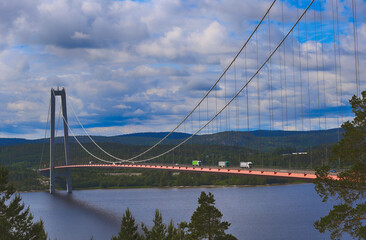 The High Coast Bridge

Höga Kusten Bridge
The High Coast Bridge, also known as the Veda Bridge, is a suspension bridge crossing the mouth of the river Ångermanälven near Veda, on the border between th