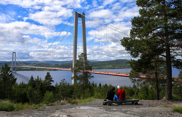 The High Coast Bridge

Höga Kusten Bridge
The High Coast Bridge, also known as the Veda Bridge, is a suspension bridge crossing the mouth of the river Ångermanälven near Veda, on the border between th