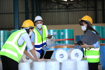 Team workers wear protective face masks for safety industrial factory. worker meeting before start...