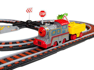 Toy train locomotive, steam locomotive with trailer trolley on the railway, rails, signs, children's railway