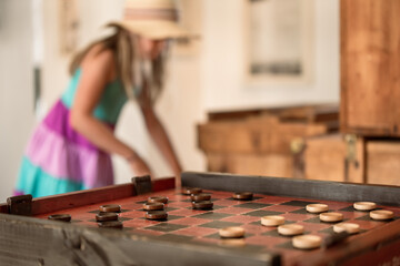 Checkers board and a girl