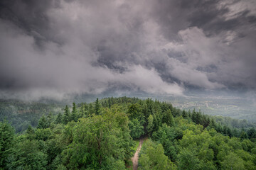 A thunderstorm moves over a hilltop in the Black Forest