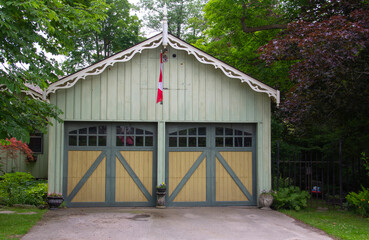 Fototapeta na wymiar Quaint garage with Canadian flag