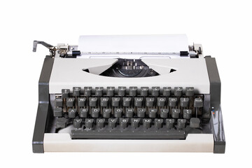 Traditional typewriter on sheets of paper. Accessories used by writers and editors.