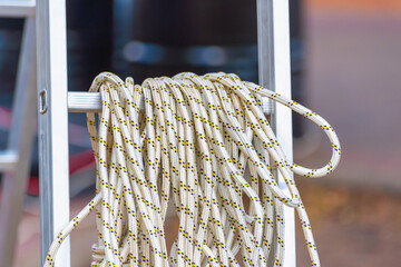 Ladder and rope for work.