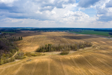 Fototapeta na wymiar Aerial view of agricultural landscape with fields in spring season.