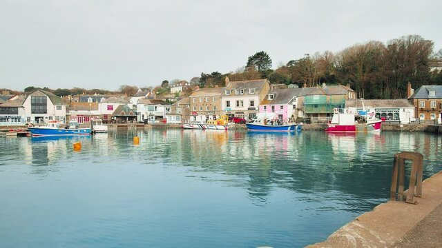 Padstow Harbour, Cornwall, England, United Kingdom by River Camel in 4K. Many ships, boats and nautical vessels with beautiful English Restaurants, Pubs and cafes.