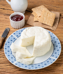 Frescal cheese, typical brazilian fresh white cheese with jam and toasts