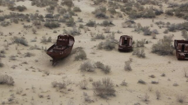 Rusting ships at the Ship Cemetery near Moynaq village at the former coast of Aral Sea