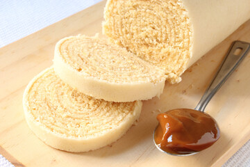 Traditional sliced ​​dulce de leche roll cake