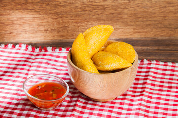 Delicious empanadas, Colombian cuisine. on the wooden table