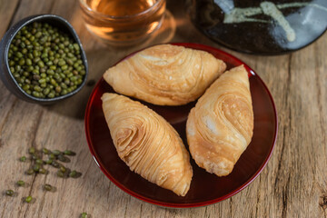 Set of curry puff on wood table