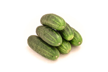 Pyramid of cucumbers on a white background