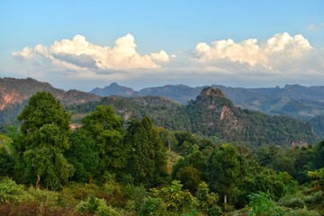 The scenery of the mountains and the fog at sunrise, feel fresh and relaxed.