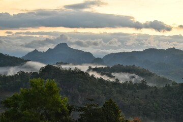 The scenery of the mountains and the fog at sunrise, feel fresh and relaxed.