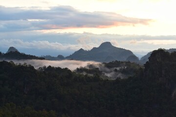 The scenery of the mountains and the fog at sunrise, feel fresh and relaxed.